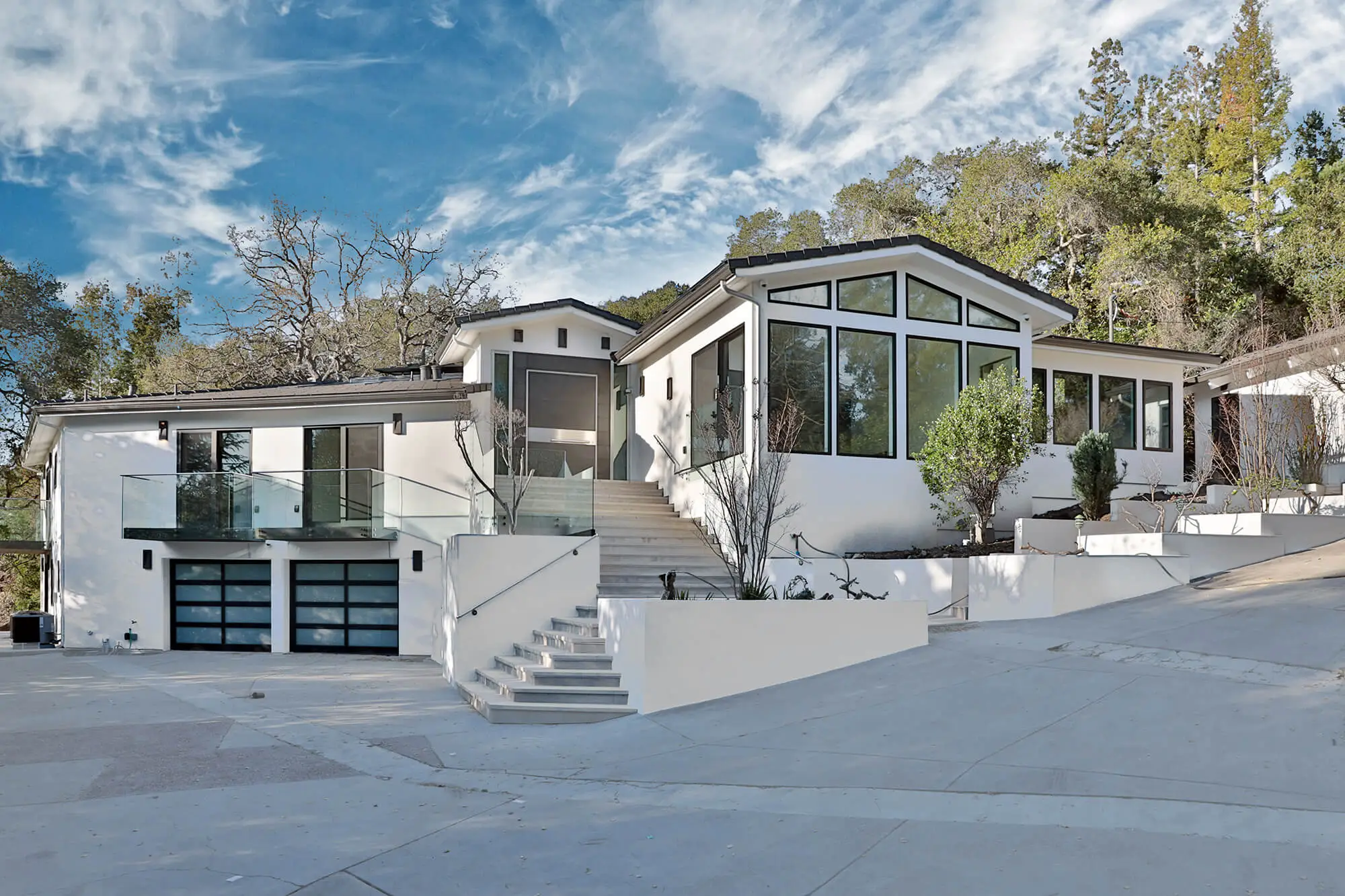 new construction home in bay area California with large windows, black trim and concrete